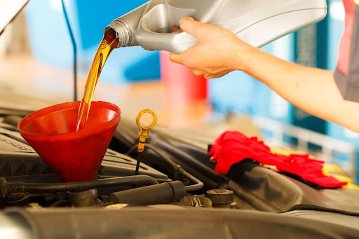 synthetic oil change being performed